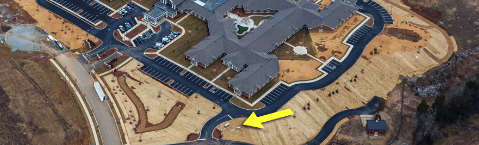 An overhead map view of property showing the backflow enclosure location not being at the main entrance to the property.