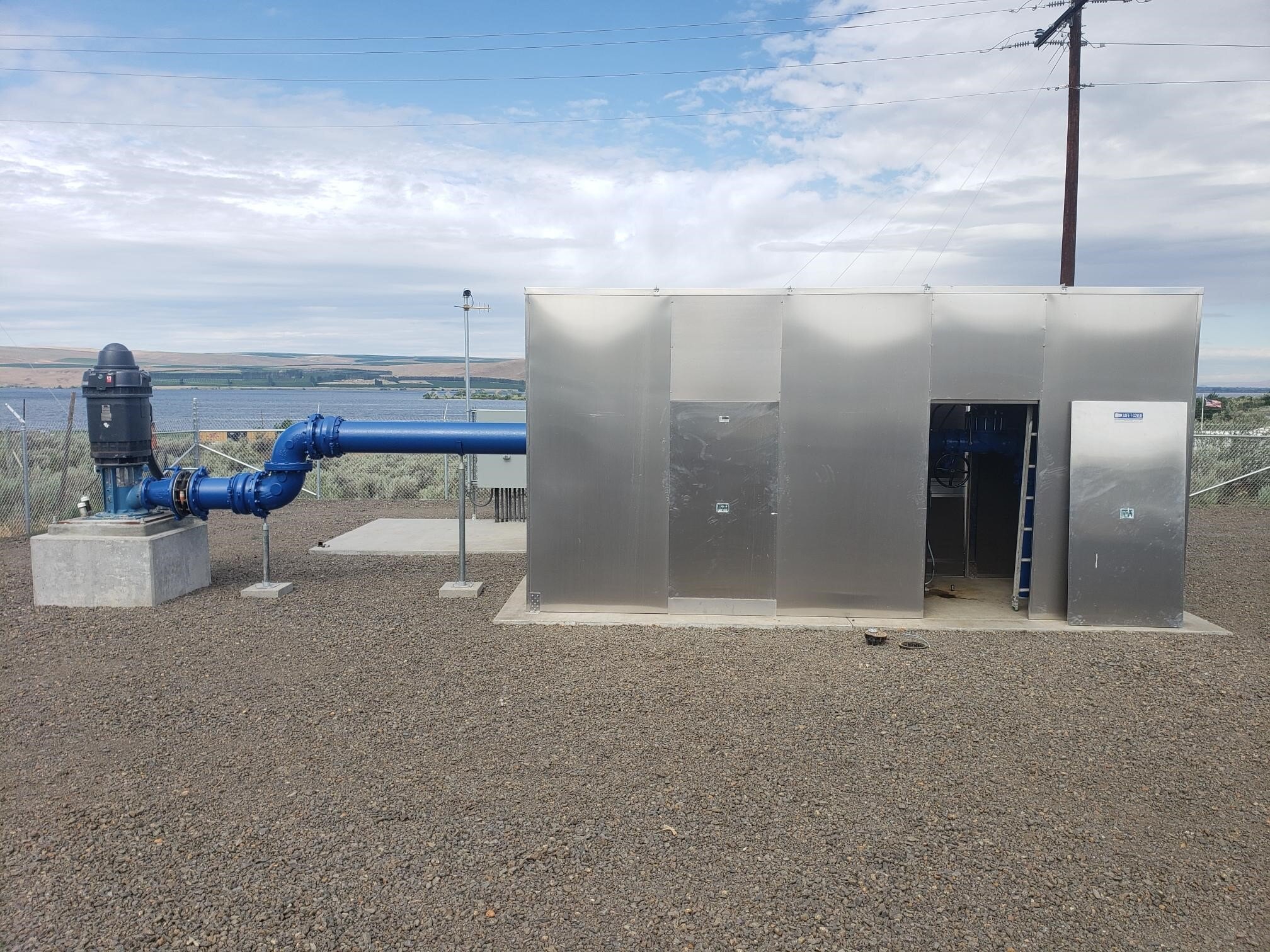 A custom aluminum enclosure that provides easy access to pump equipment for maintenance and lessens noise pollution.