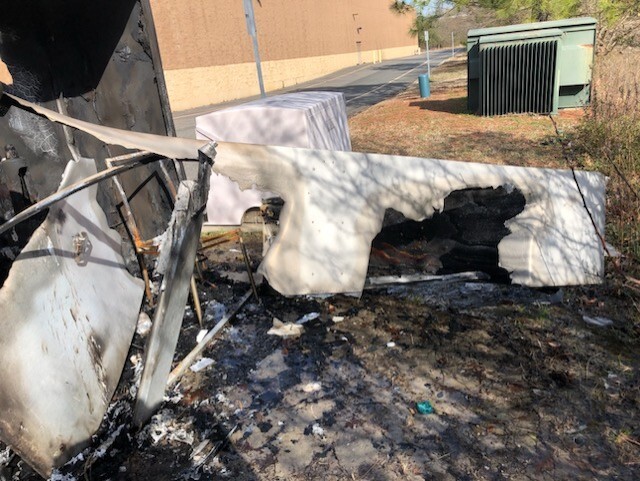 Requirements for fire resistance were not met on this enclosure, and it lays damaged in ruins after a fire event burned openings in the aluminum. This can endanger backflow equipment and the person who started the fire inside.