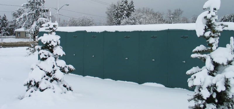 An appropriately sized aluminum enclosure keeps backflow equipment safe from snow and freezing temperatures.