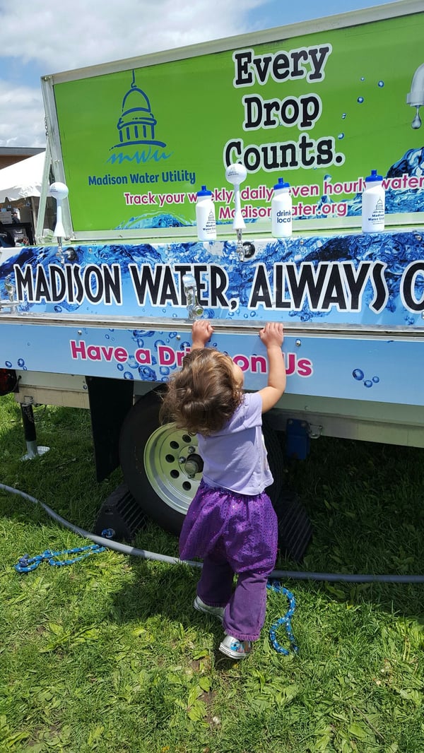 Madison Water Utility girl at wagon