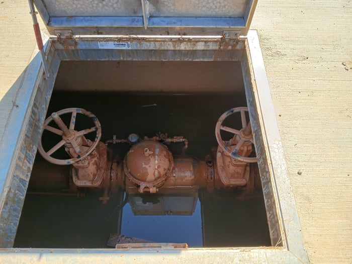 A flooded vault is a hazard for backflow systems and a danger to the water supply.