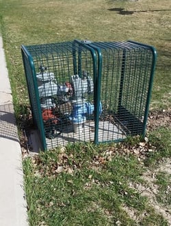 backflow-preventer-cage at a school.jpg