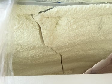 insulation cracking off a fiberglass enclosure