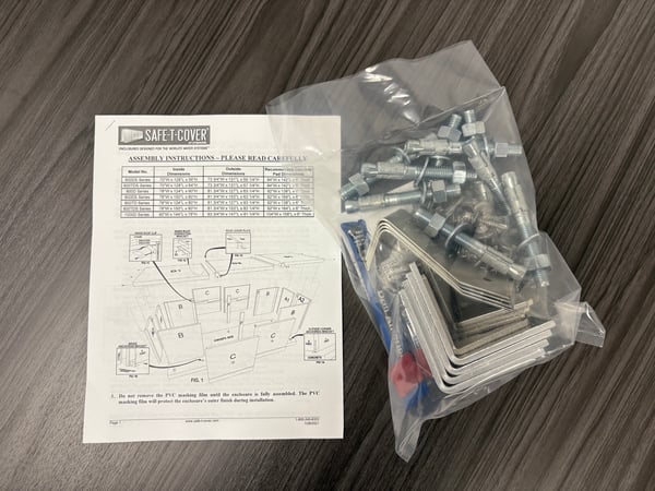 An example hardware kit with instructions required for a Safe-T-Cover aluminum enclosure assembly.