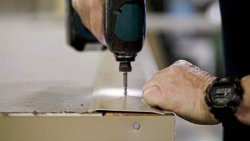 The exterior aluminum on a pump enclosure