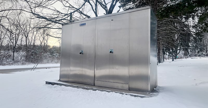 Backflow equipment stays safe from freezing temperatures in a Safe-T-Cover heated aluminum enclosure