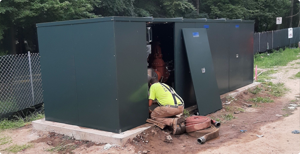worker gaining access in safe-t-cover enclosure